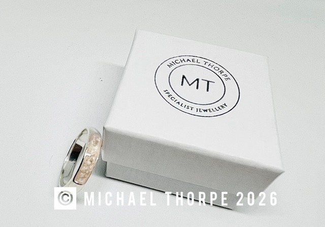 Sterling silver memorial band rings.