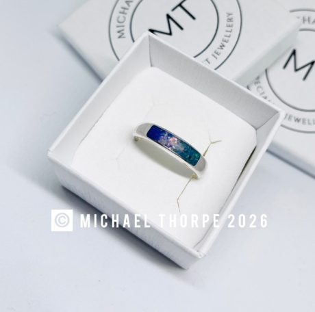 Unisex sterling silver band.