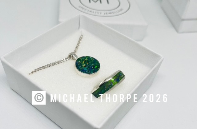 Set using green oynx, ocean blue and lavender opals.