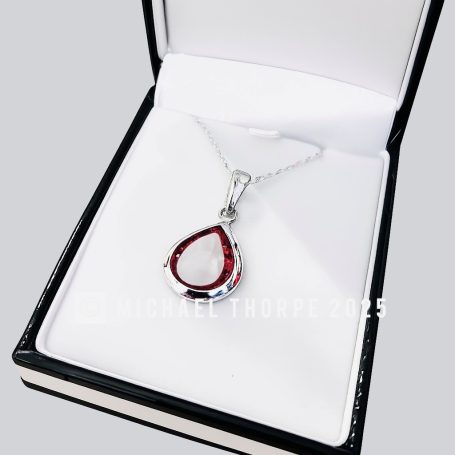 Tear drop pendant with a twist.